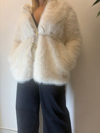 Ecopelliccia con cappuccio