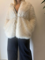 Ecopelliccia con cappuccio