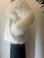 Ecopelliccia con cappuccio